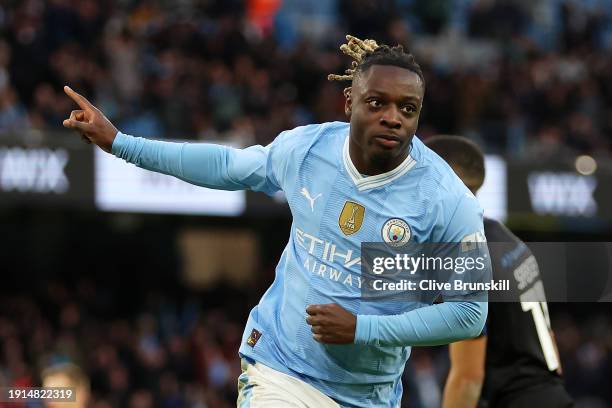 Jeremy Doku of Manchester City celebrates scoring his team's fifth goal during the Emirates FA Cup Third Round match between Manchester City and...