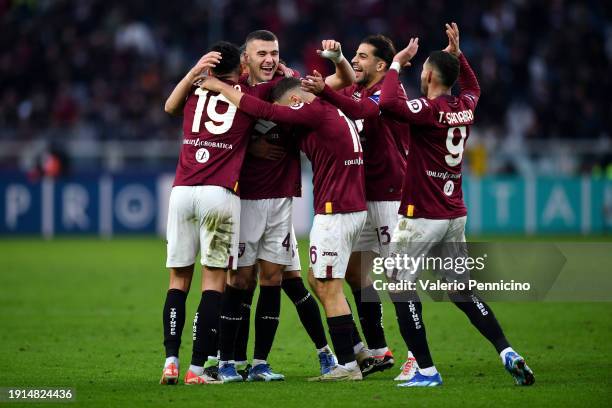 Alessandro Buongiorno of Torino FC celebrates scoring his team's third goal with teammates during the Serie A TIM match between Torino FC and SSC...