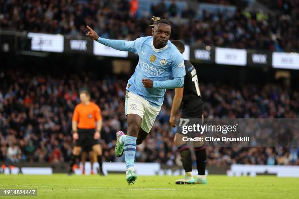 Jeremy Doku of Manchester City celebrates scoring his team's fifth goal during the Emirates FA Cup Third Round match between Manchester City and...