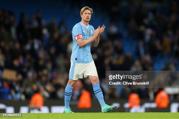 Kevin De Bruyne of Manchester City applauds the fans after the team's victory in the Emirates FA Cup Third Round match between Manchester City and...