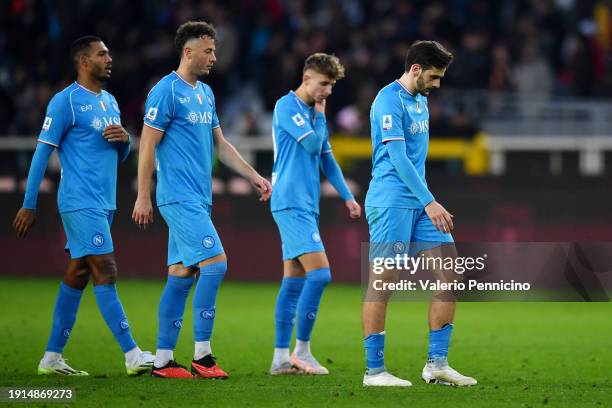 Amir Rrahmani and Khvicha Kvaratskhelia of SSC Napoli look dejected after the team's defeat in the Serie A TIM match between Torino FC and SSC Napoli...