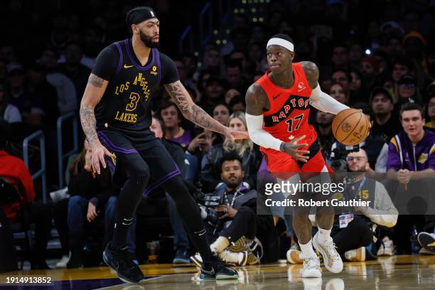 Los Angeles, CA, Tuesday, January 9, 2024 - Toronto Raptors guard Dennis Schroder dribbles against Los Angeles Lakers forward Anthony Davis at...