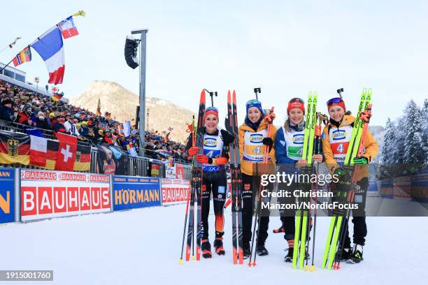 Hanna Kebinger of Germany, Franziska Preuss of Germany, Sophia Schneider of Germany, Janina Hettich-Walz of Germany pose for the photographers during...