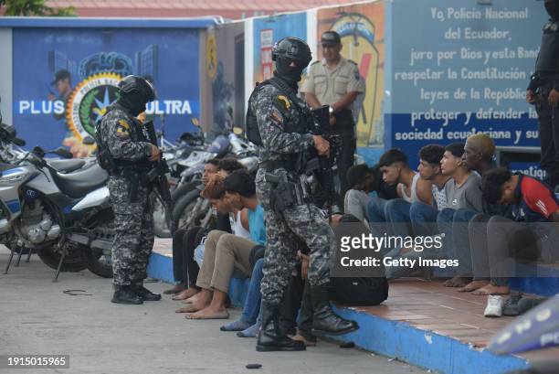 Police present detainees in the case of TC Televisión on January 10, 2024 in Guayaquil, Ecuador. President Noboa declared "internal armed conflict"...