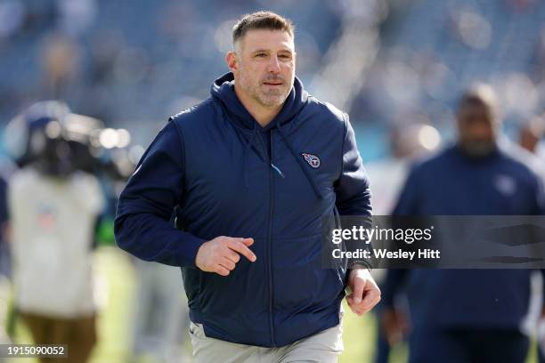 Tennessee Titans head coach Mike Vrabel runs on the field before the game against the Jacksonville Jaguars at Nissan Stadium on January 07, 2024 in...