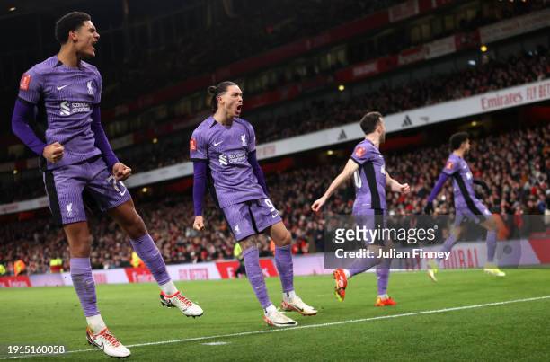 Jarell Quansah and Darwin Nunez of Liverpool celebrate their team's first goal, an own goal scored by Jakub Kiwior of Arsenal during the Emirates FA...