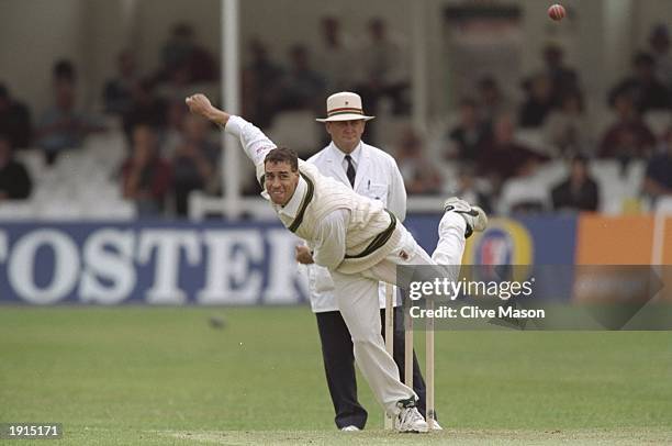 Michael Bevan of Australia bowls a ball during the first test match against England at Edgbaston Cricket Ground in Birmingham, England. \ Mandatory...