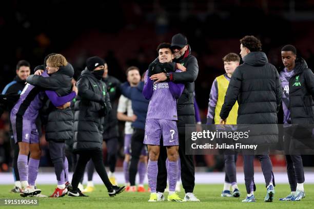 Luis Diaz of Liverpool is embraced by his Manager Juergen Klopp after the team's victory in the Emirates FA Cup Third Round match between Arsenal and...