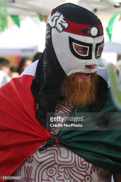 Man is wearing a Mexican wrestling mask as members of the Mexican diaspora are celebrating Mexican Independence Day in Toronto, Ontario, Canada, on...