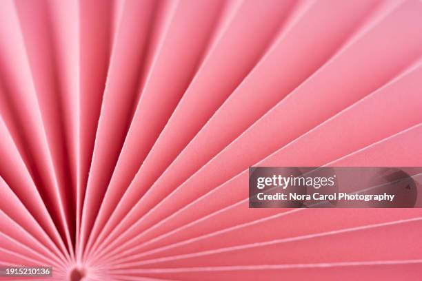 pink hand fan background - hand fan stock pictures, royalty-free photos & images