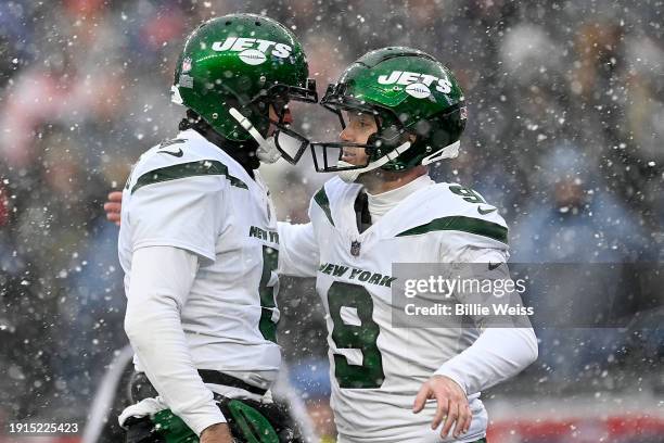 Thomas Morstead of the New York Jets and Greg Zuerlein of the New York Jets celebrate after a field goal in the first quarter at Gillette Stadium on...