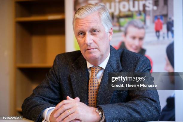 Belgium King Philippe is listening during a visits of the "Train Hostel" center a winter reception system for homeless people managed by the Red...