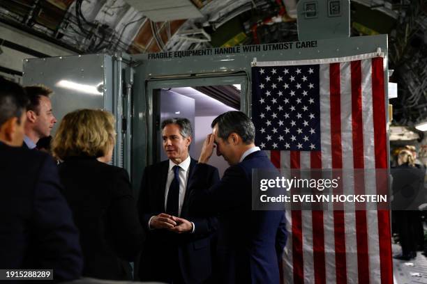 Secretary of State Antony Blinken talks with Assistant Secretary of State for Near Eastern Affairs Barbara Leaf , and Spokesperson Matthew Miller...