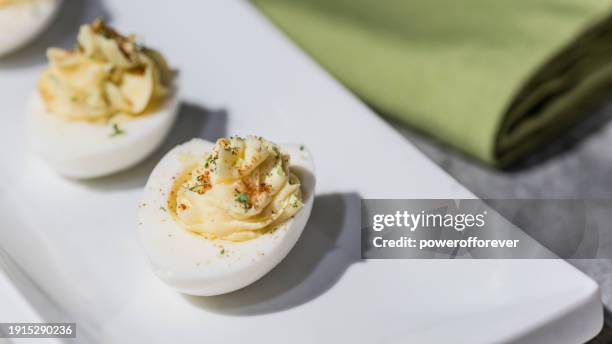 deviled eggs - deviled egg stock pictures, royalty-free photos & images