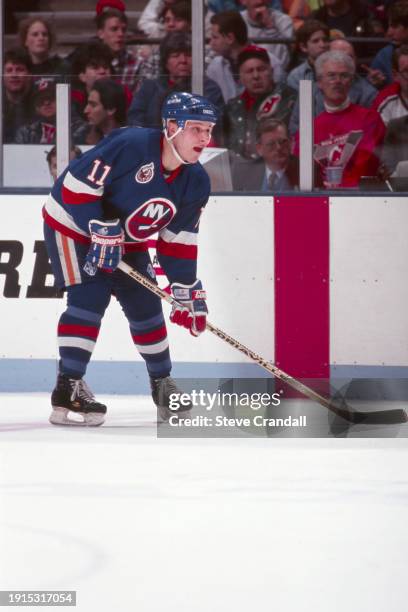 New York Islander's defenseman, Darius Kasparaitis, awaiting the face off to take place during the game against the NJ Devils at the Meadowlands...