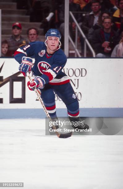 New York Islander's defenseman, Darius Kasparaitis, is about to receive the puck during the game against the NJ Devils at the Meadowlands Arena ,East...