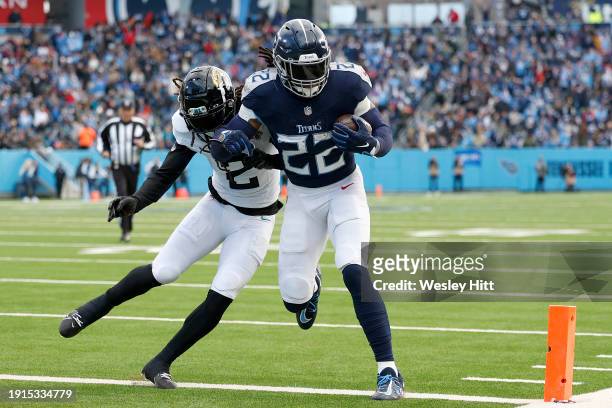 Derrick Henry of the Tennessee Titans runs with the ball for a touchdown during the second quarter against the Jacksonville Jaguars at Nissan Stadium...