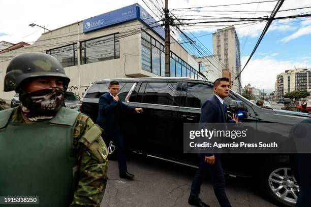 Military and security personnel guards a car with President of Ecuador Daniel Noboa as he leaves Canela Radio on January 10, 2024 in Quito, Ecuador....