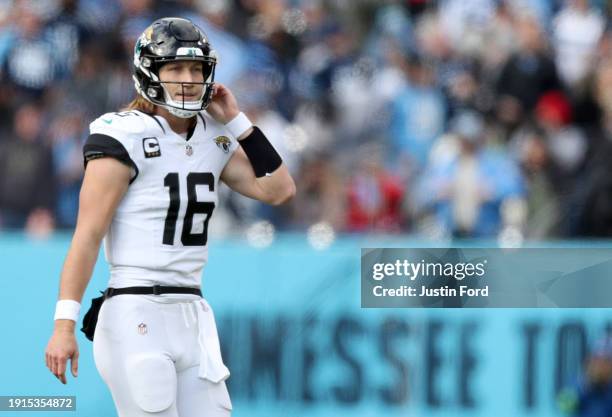 Trevor Lawrence of the Jacksonville Jaguars reacts during the first half against the Tennessee Titans at Nissan Stadium on January 07, 2024 in...