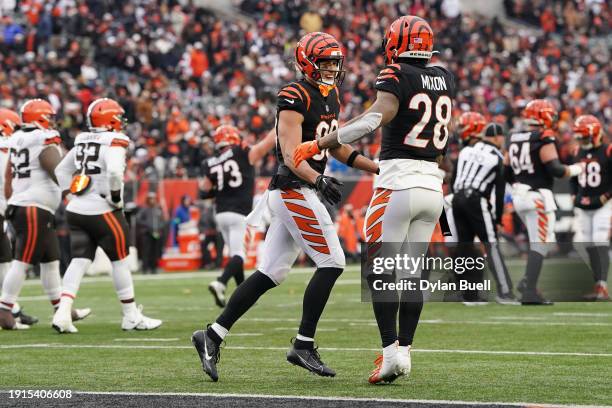 Andrei Iosivas of the Cincinnati Bengals celebrates after a touchdown with Joe Mixon of the Cincinnati Bengals during the third quarter in the game...