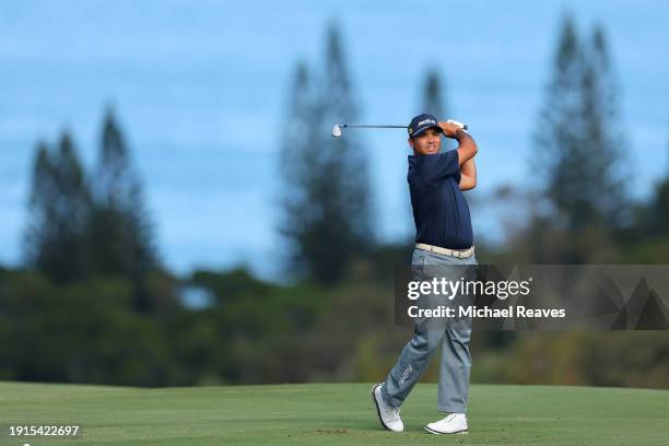 Jason Day of Australia plays an approach shot on the fourth hole during the final round of The Sentry at Plantation Course at Kapalua Golf Club on...