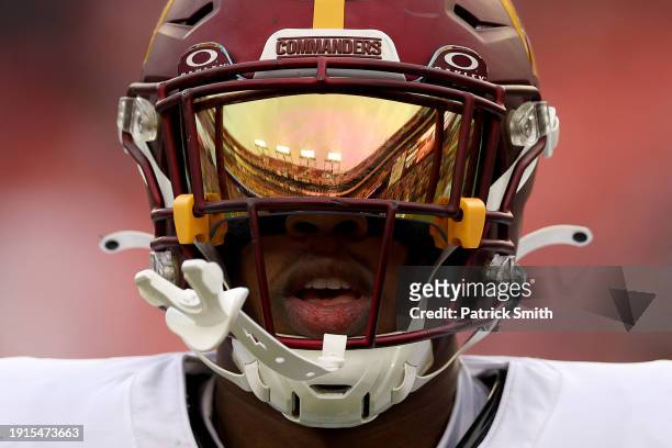 Henry of the Washington Commanders warms up before the game against the Dallas Cowboys at FedExField on January 07, 2024 in Landover, Maryland.