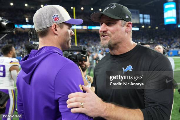 Head coach Kevin O'Connell of the Minnesota Vikings and head coach Dan Campbell of the Detroit Lions embrace after the game at Ford Field on January...