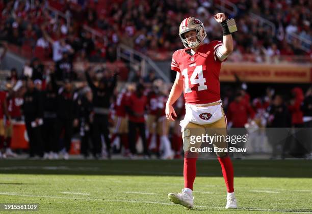 Sam Darnold of the San Francisco 49ers celebrates after a touchdown in the first quarter during a game against the Los Angeles Rams at Levi's Stadium...