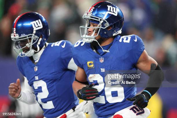 Saquon Barkley and Tyrod Taylor of the New York Giants celebrates after a touchdown during the second quarter in the game against the Philadelphia...