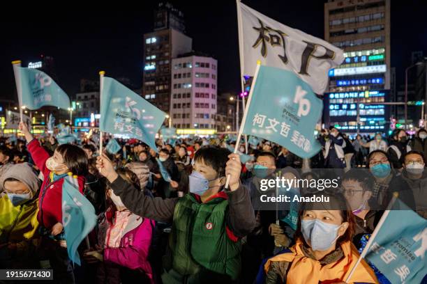 Supporters of Taiwan People's Party presidential candidate, Ko Wen-je, gather during a campaign rally ahead of presidential election scheduled for...