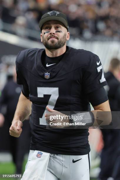 Brian Hoyer of the Las Vegas Raiders runs off the field at halftime in the game against the Denver Broncos at Allegiant Stadium on January 07, 2024...