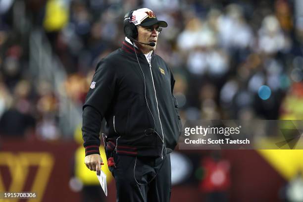 Washington Commanders head coach Ron Rivera looks on from the sideline during the second quarter against the Dallas Cowboys at FedExField on January...
