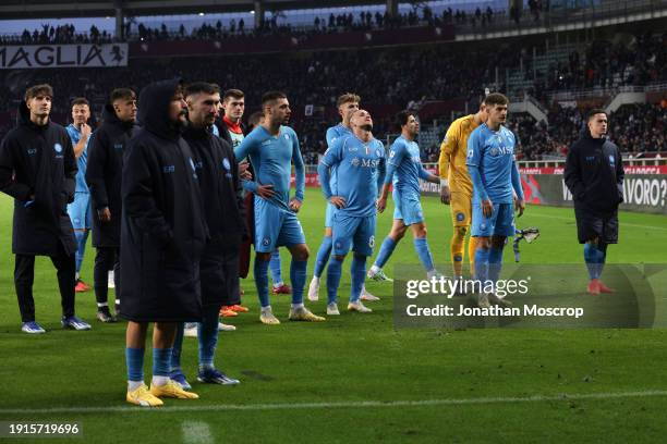 Napoli players react to the 3-0 defeat as they stand in front of disgruntled fans following the final whistle of the Serie A TIM match between Torino...