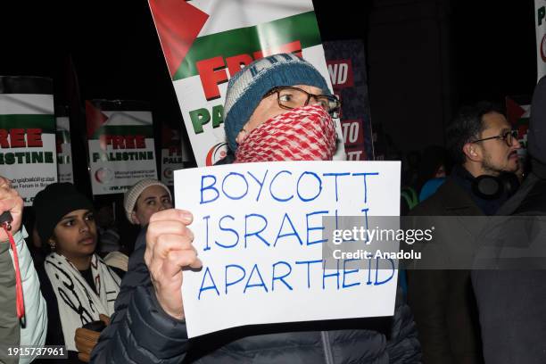 Pro-Palestinian protesters gather outside Houses of Parliament to demonstrate against the anti-boycott bill on its third reading that if passed by...