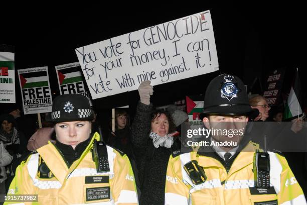 Pro-Palestinian protesters gather outside Houses of Parliament to demonstrate against the anti-boycott bill on its third reading that if passed by...