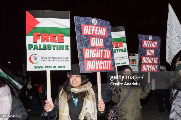 Pro-Palestinian protesters gather outside Houses of Parliament to demonstrate against the anti-boycott bill on its third reading that if passed by...