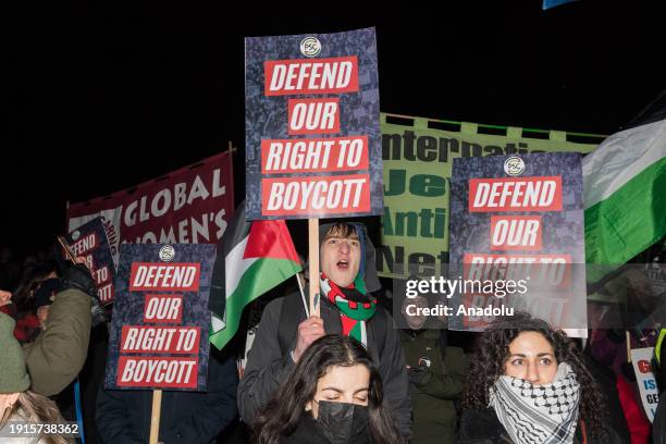 Pro-Palestinian protesters gather outside Houses of Parliament to demonstrate against the anti-boycott bill on its third reading that if passed by...