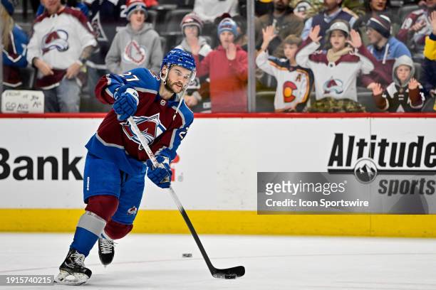 Colorado Avalanche left wing Jonathan Drouin shoots as he warms up before a game against the Boston Bruins between the Boston Bruins and the Colorado...