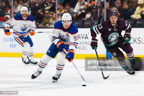 Edmonton Oilers center Ryan Nugent-Hopkins skates with the puck during an NHL hockey game against the Anaheim Ducks on December 31, 2023 at Honda...