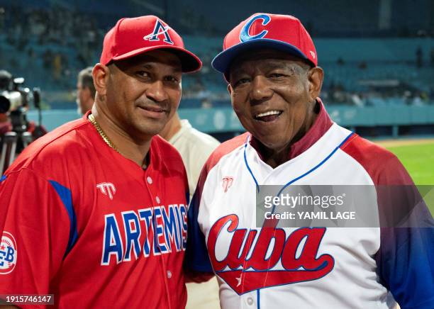 Cuban former baseball player Tony Oliva , member of the MLB Hall of Fame, poses for a picture with Artemisa's Frederich Cepeda before the match...