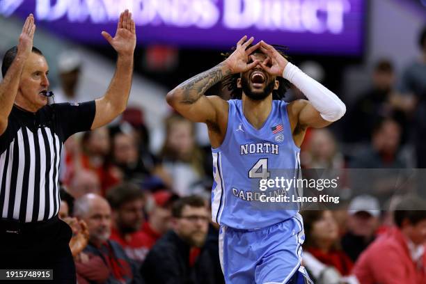 Davis of the North Carolina Tar Heels reacts following a three-point basket signalled by official Roger Ayers during the second half against the NC...