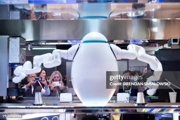 An Adam robot from Richtech Robotics makes coffee at the Las Vegas Convention Center during the Consumer Electronics Show January 10 in Las Vegas,...