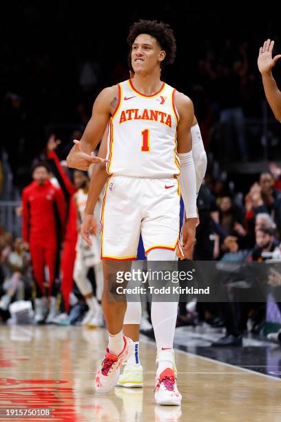 Jalen Johnson of the Atlanta Hawks reacts after sinking a three-pointer in overtime against the Philadelphia 76ers at State Farm Arena on January 10,...