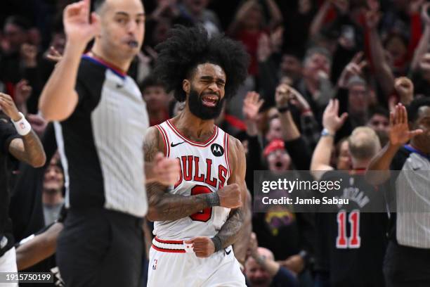 Coby White of the Chicago Bulls celebrates after making a three-point basket in overtime against the Houston Rockets on January 10, 2024 at United...