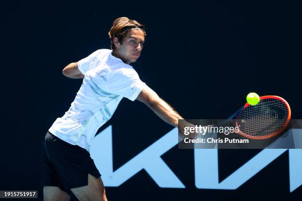 Flavio Cobolli of Italy on his way to beating Benjamin Hassan of Lebanon in qualifying for the 2024 Australian Open at Melbourne Park.