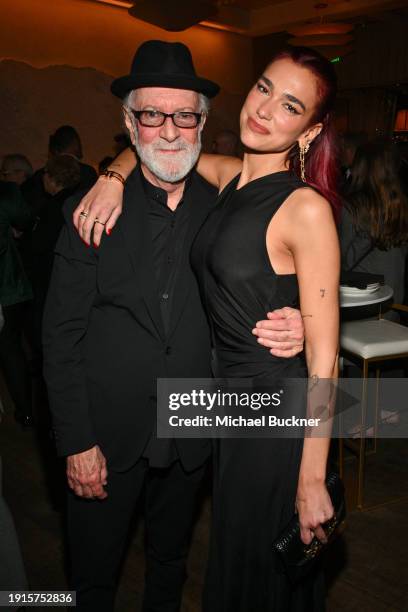 Gary Goetzman and Dua Lipa at the premiere of "Master of the Air" held at Regency Village Theatre on January 10, 2024 in Los Angeles, California.