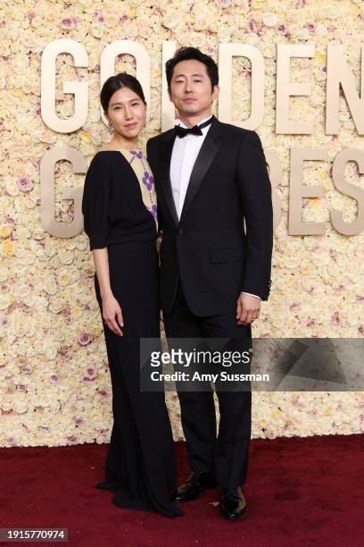 Joana Pak and Steven Yeun attend the 81st Annual Golden Globe Awards at The Beverly Hilton on January 07, 2024 in Beverly Hills, California.