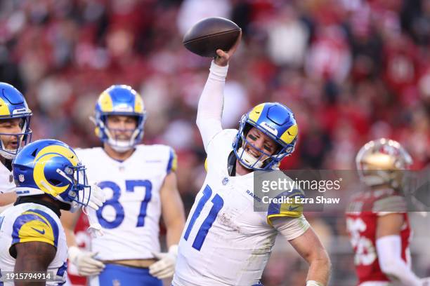 Carson Wentz of the Los Angeles Rams celebrates after a rushing touchdown in the fourth quarter against the San Francisco 49ers at Levi's Stadium on...