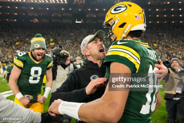 Head coach Matt LaFleur of the Green Bay Packers and Jordan Love of the Green Bay Packers embrace after a win over the Chicago Bears at Lambeau Field...