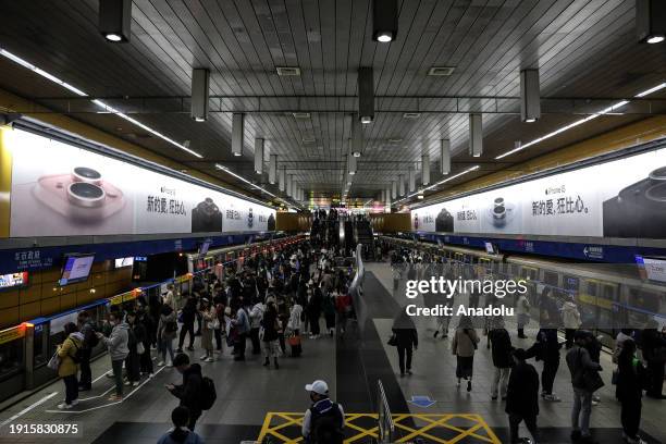 People walk on platforms at a metro station as daily life continues ahead of general election in Taipei, Taiwan on January 9, 2024. Voters will elect...